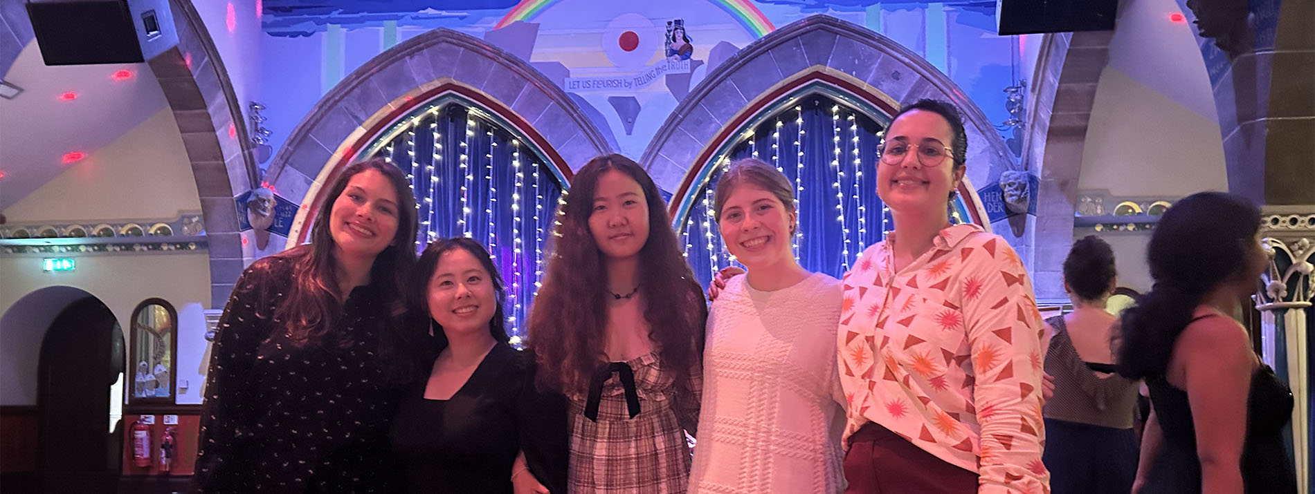 group of students at an evening event