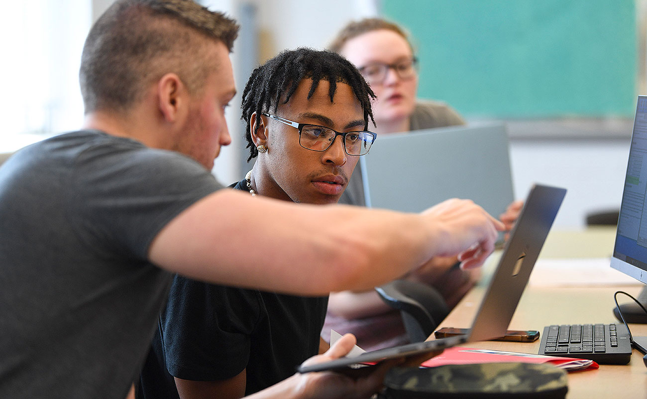 A student and a professor working