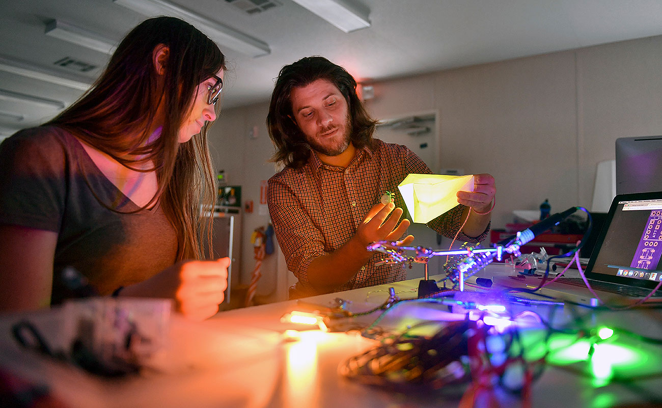 Two students working on a LED circuit