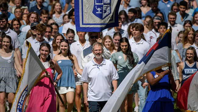 Dr. Briggs marching at Mountain Day
