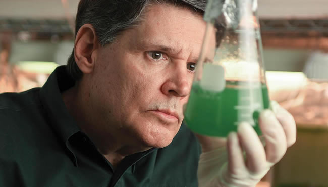 Mark Aubel holding a test tube