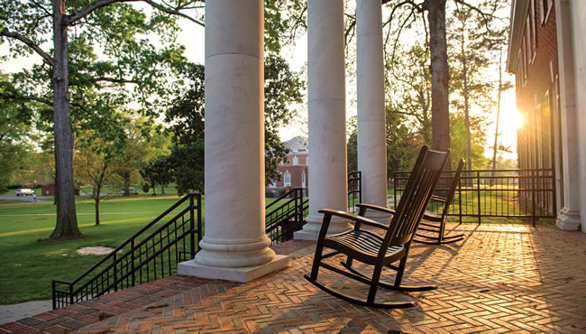 A rocking chair at sunset