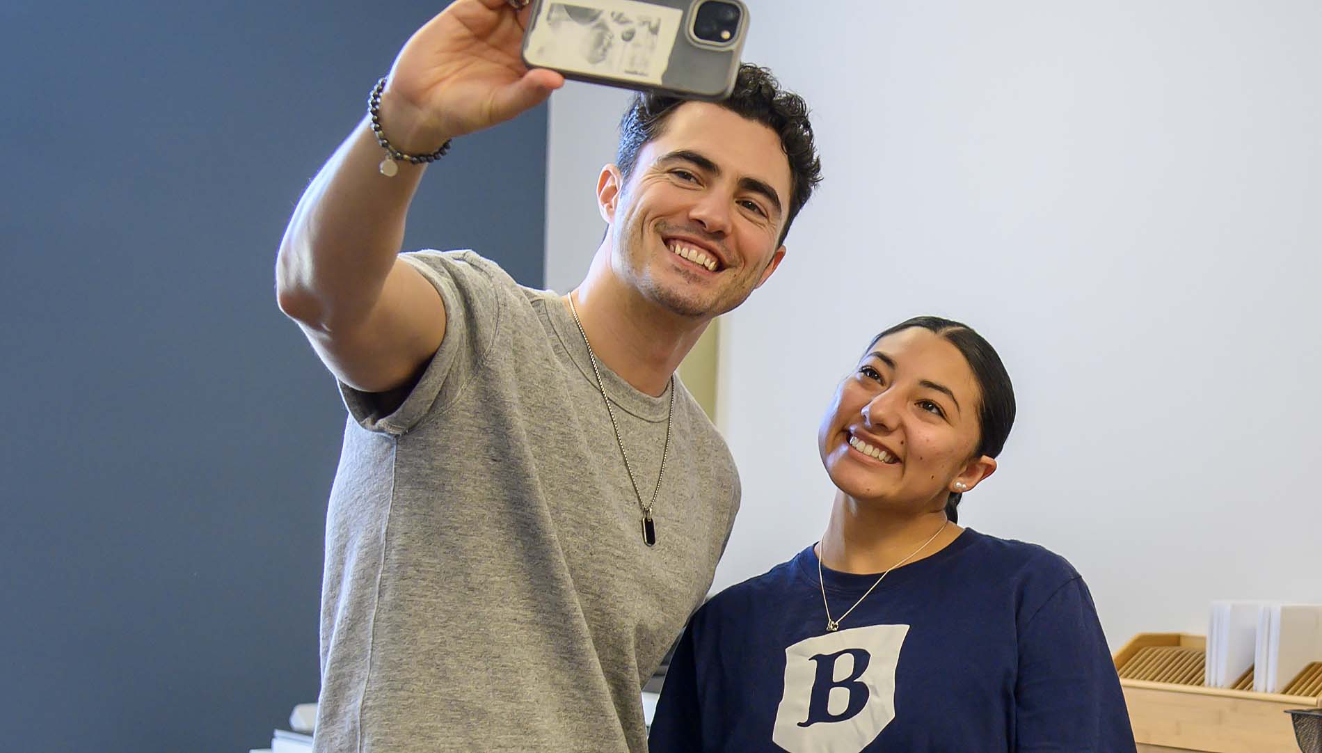 Darren Barnet takes a selfie with Jenny Lozano
