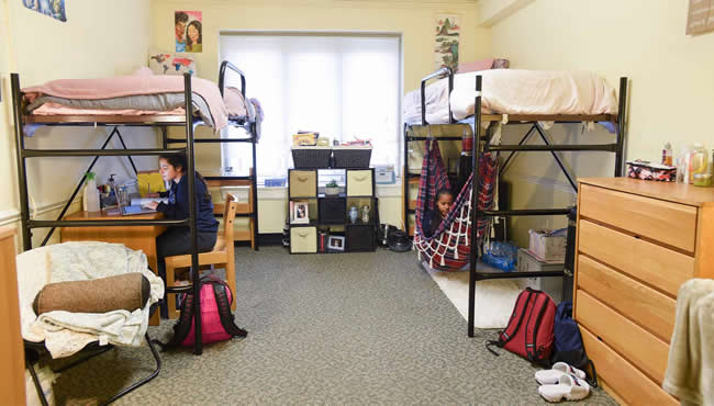 Two girls in their dorm in Ford Building