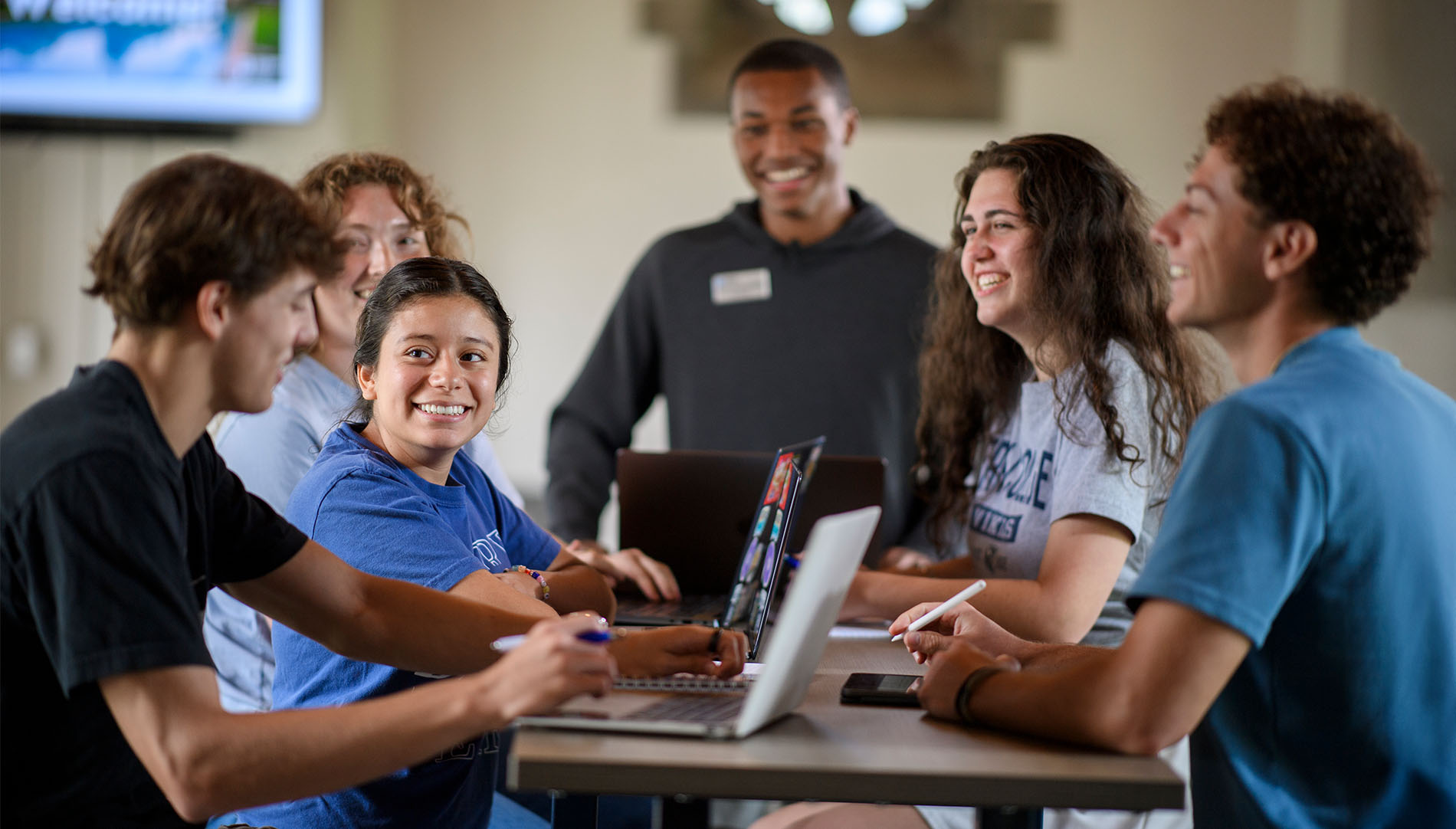 Group of students chatting in class