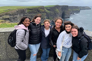 group of student in front of cliffside