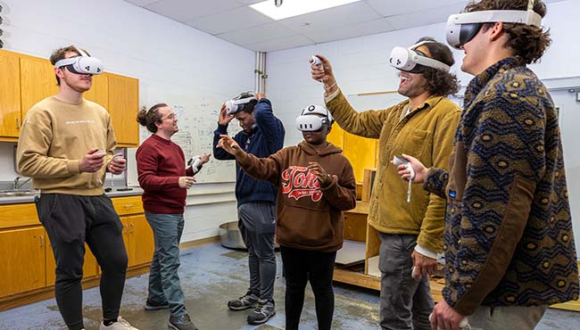 group of students wearing VR goggles