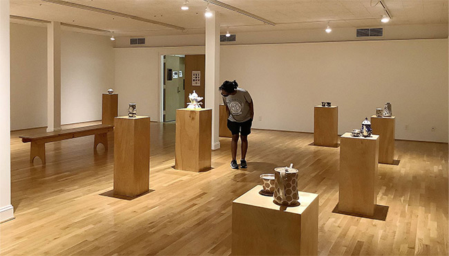 Person looking at art