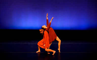 two girls dancing on stage