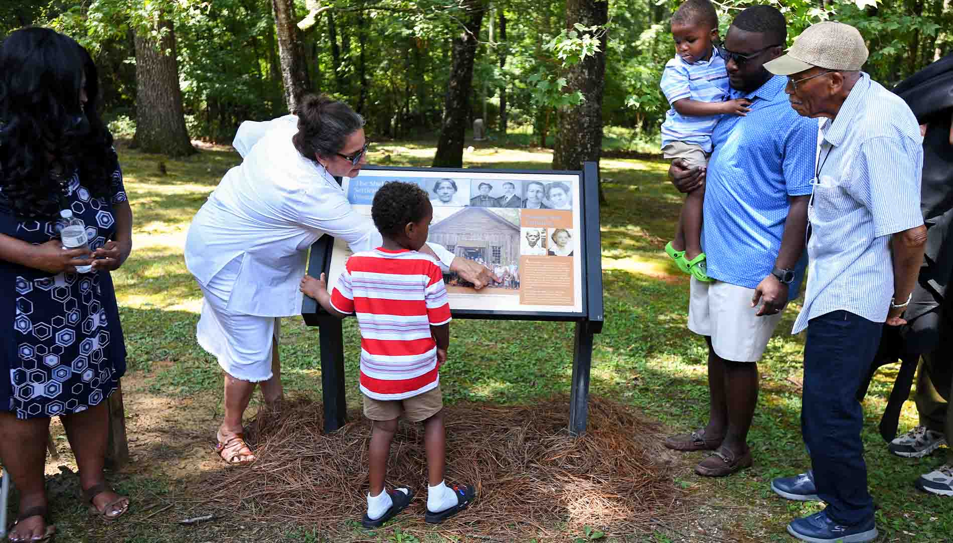 Steve Briggs presents staff with award
