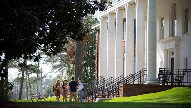 Three Berry students standing outside of Evans Hall