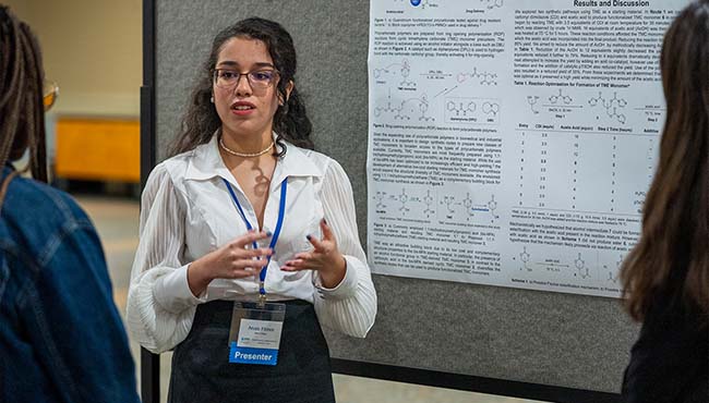 female student giving presentation
