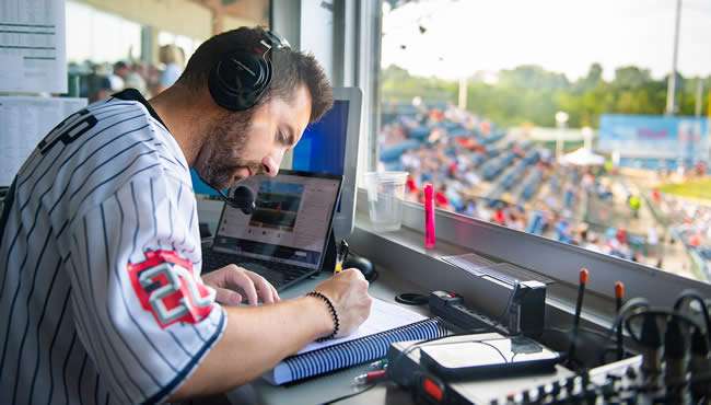 Sports announcer at game