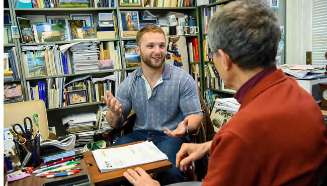 Lucas Kinsey in an office setting