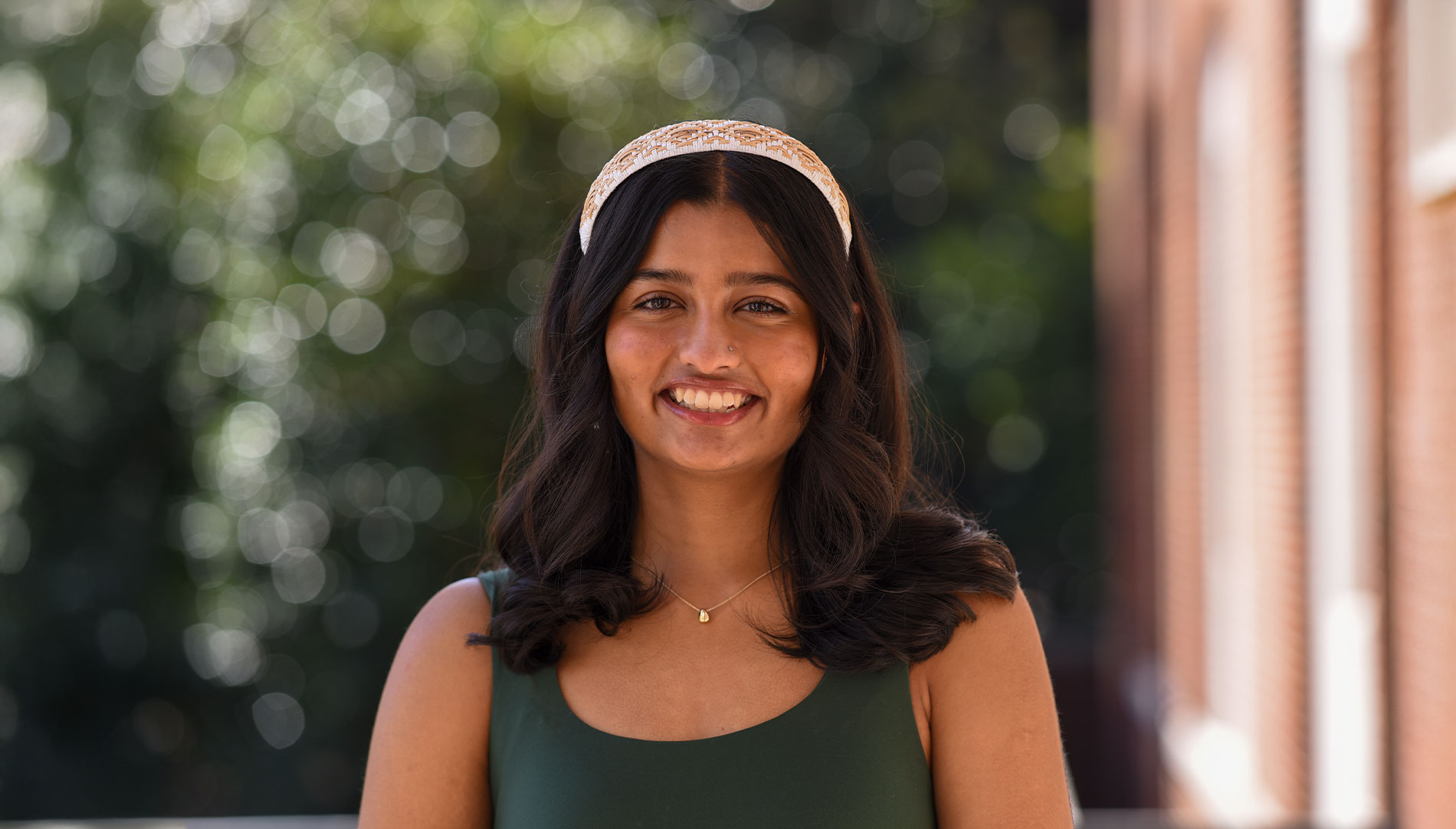 Harvy Patel smiling in an outdoor professional headshot