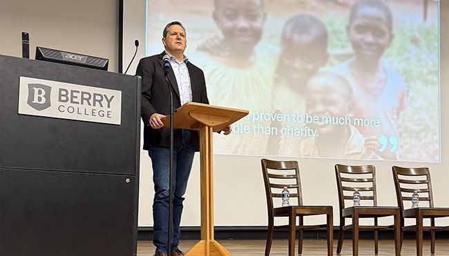 Dr. Cash giving a presentation to Berry students