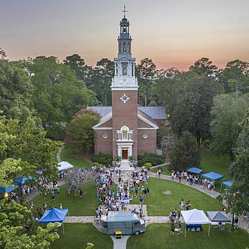 student event on college chapel lawn